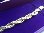 A beautiful ladies bracelet in a stunning box,  and other items